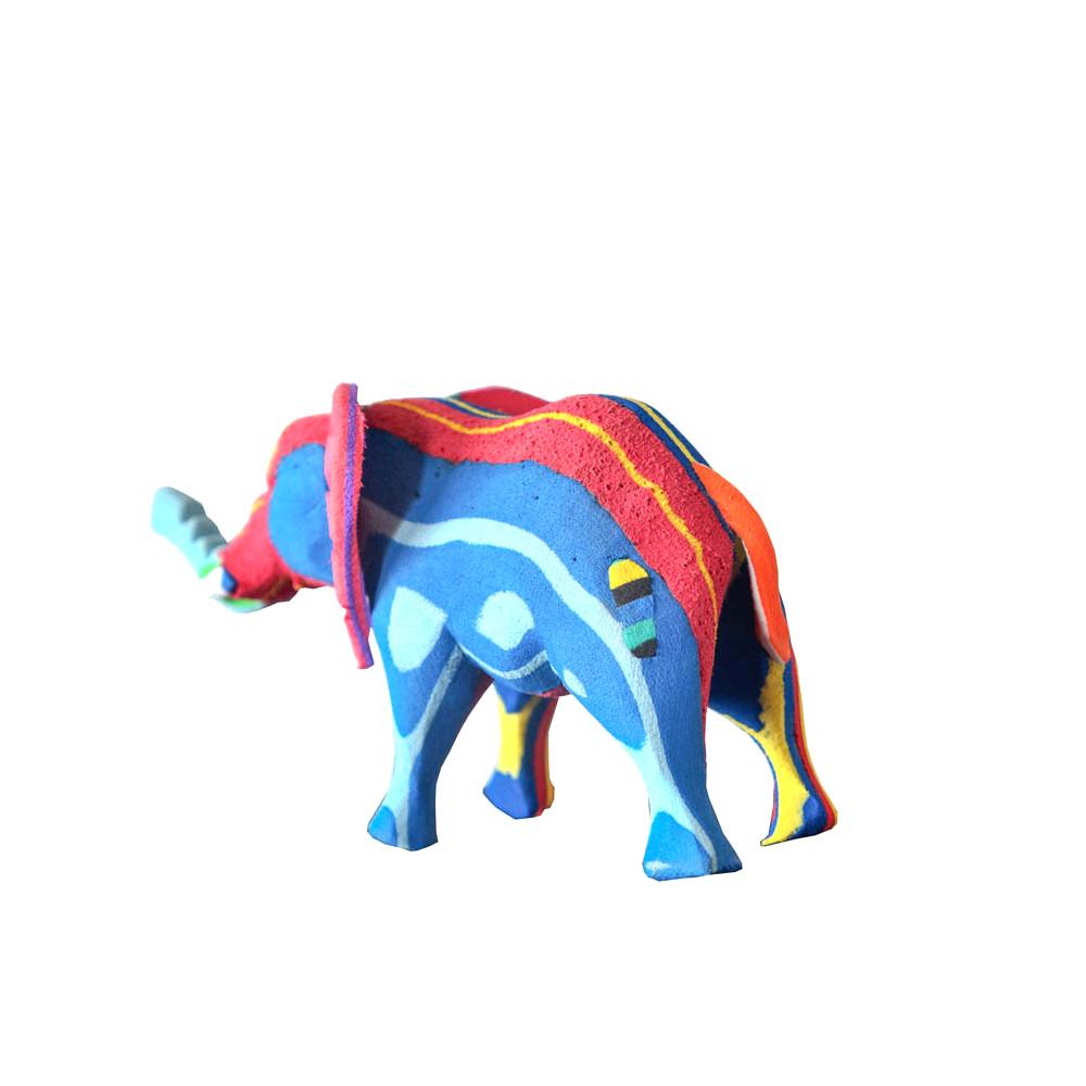 Hand-carved multicolored elephant sculpture made of upcycled flip flops by Ocean Sole.