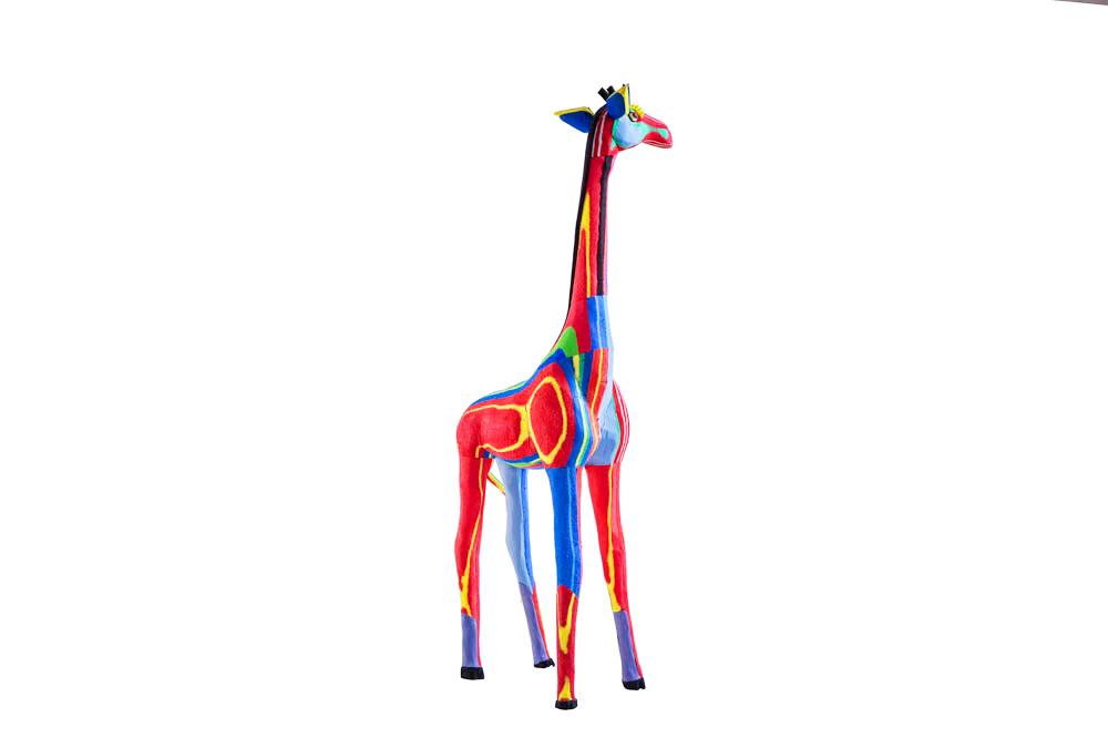 Hand-carved multicolored giraffe sculpture made of upcycled flip flops by Ocean Sole.