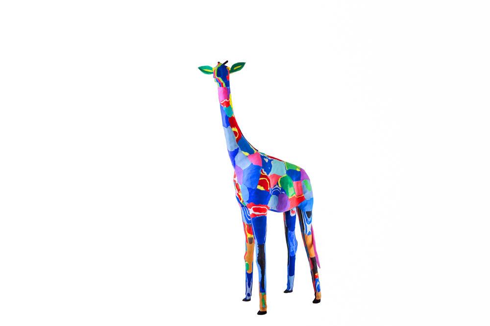 Hand-carved multicolored giraffe sculpture made of upcycled flip flops by Ocean Sole.