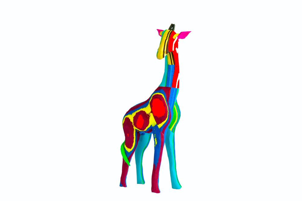 Hand-carved multicolored giraffe sculpture made of upcycled flip flops by Ocean Sole.