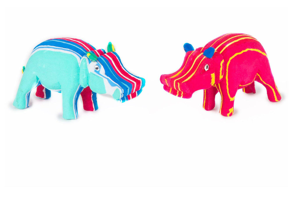 Two hand-carved multicolored hippo sculpture made of upcycled flip flops by Ocean Sole.
