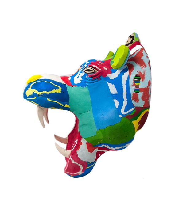 Hand-carved multicolored hippo wall art sculpture made of upcycled flip flops by Ocean Sole designed to hang on your wall.
