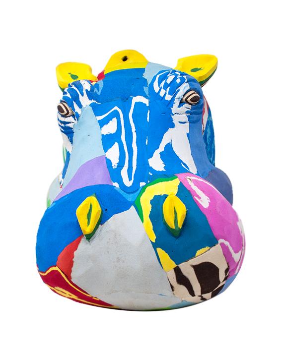 Hand-carved multicolored hippo wall art sculpture made of upcycled flip flops by Ocean Sole designed to hang on your wall.