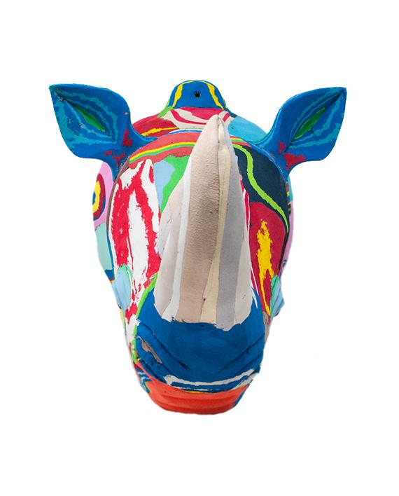 Hand-carved multicolored rhino wall art sculpture made of upcycled flip flops by Ocean Sole designed to hang on your wall.