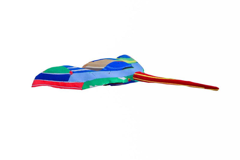 Hand-carved multicolored manta ray sculpture made of upcycled flip flops by Ocean Sole.