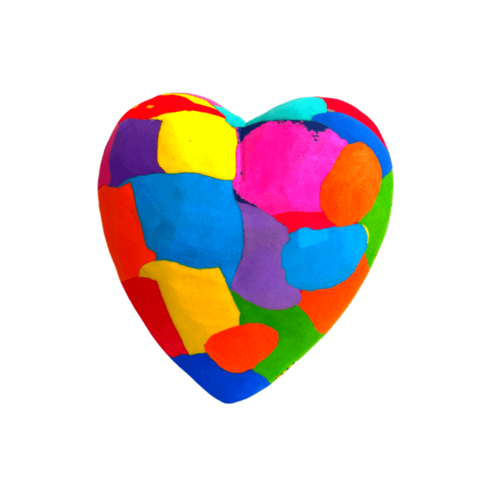 Hand-carved multicolored heart sculpture made of upcycled flip flops by Ocean Sole.