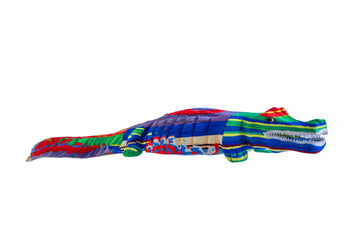 Artisan hand-carved multicolored alligator sculpture made of upcycled flip flops by Ocean Sole.