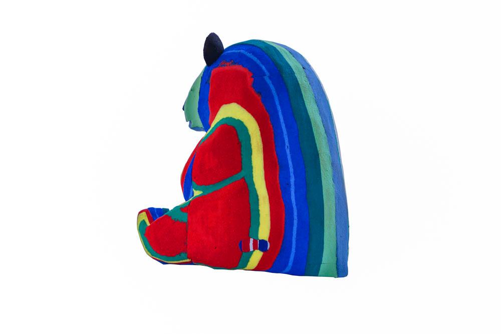 Hand-carved multicolored panda sculpture made of upcycled flip flops by Ocean Sole.