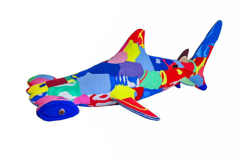Hand-carved multicolored hammerhead shark sculpture made of upcycled flip flops by Ocean Sole.