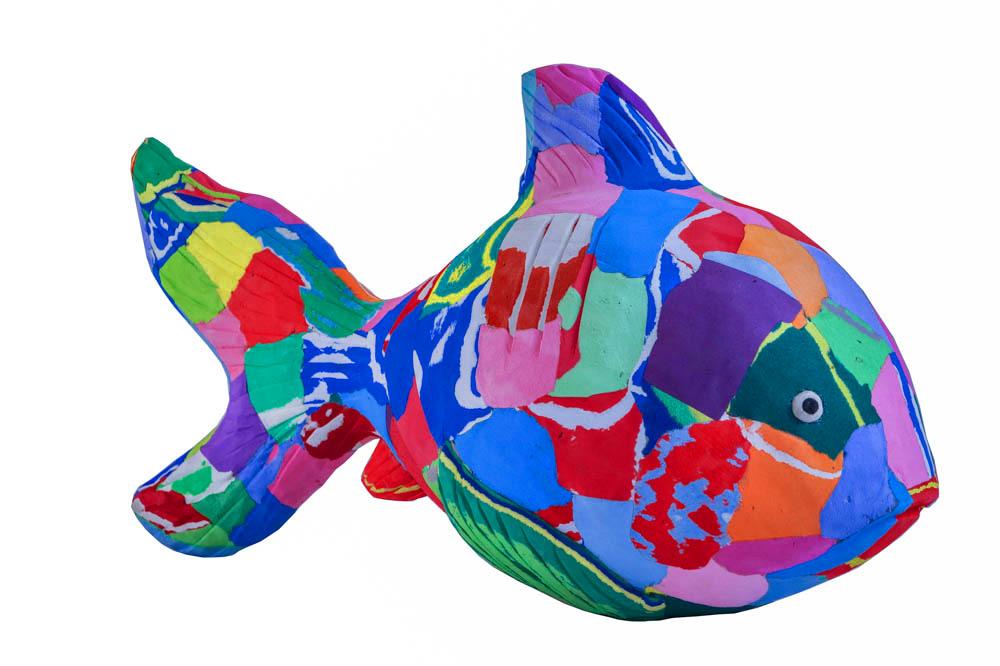 Hand-carved multicolored reef fish sculpture made of upcycled flip flops by Ocean Sole.