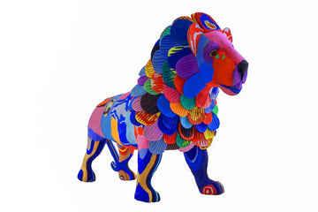 Large hand-carved multicolored standing lion sculpture made of upcycled flip flops by Ocean Sole.