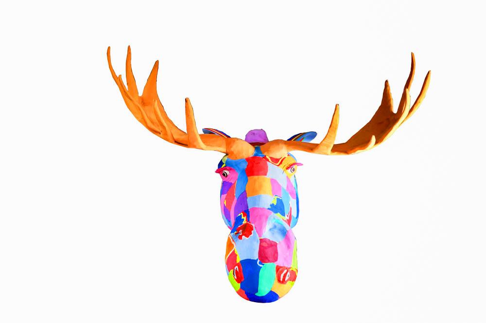 Large hand-carved multicolored moose wall art sculpture made of upcycled flip flops by Ocean Sole designed to hang on your wall.