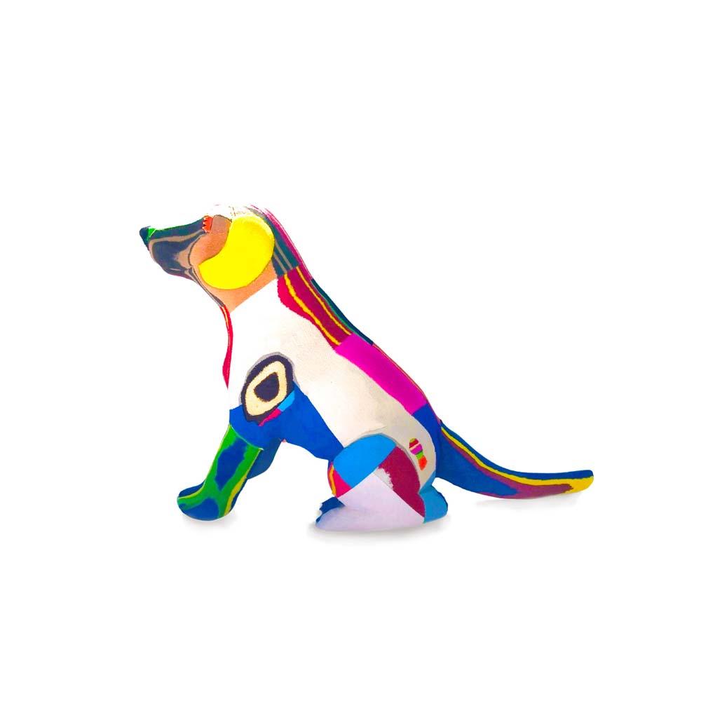 Hand-carved multicolored sitting lab dog sculpture made of upcycled flip flops by Ocean Sole.