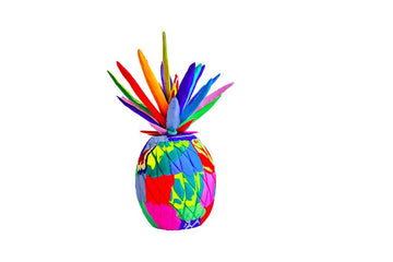 Hand-carved multicolored pineapple sculpture made of upcycled flip flops by Ocean Sole.